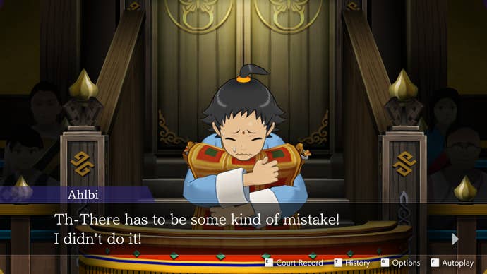 A young boy clutches a pillow on the witness stand in the Apollo Justice: Ace Attorney Trilogy