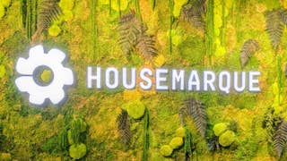 As you enter Housemarque's studio in Helsinki, you will see the studio's name and logo against a leafy backdrop behind the front desk