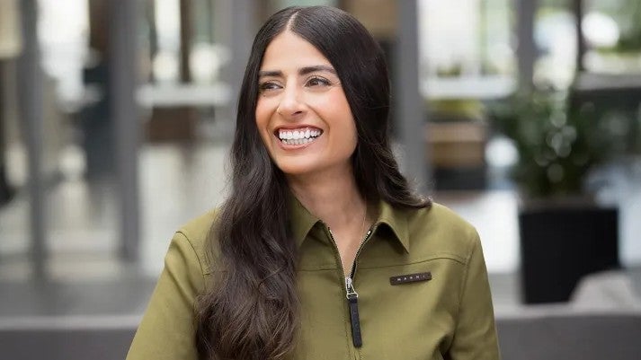 Asha Sharma from Microsoft Gaming in a green zip up jacket