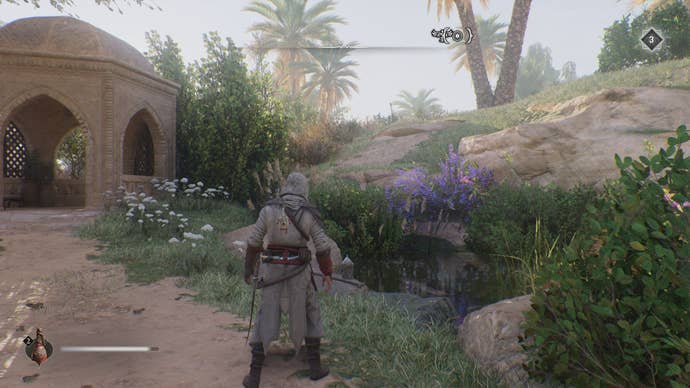 Basim faces a small pond near the Dome of the Ass where a talisman treasure can be found in Assassin’s Creed Mirage