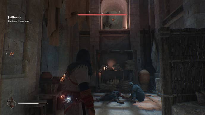 Basim stands in front of an injured civilian with a ledge above him in the Damascus Gate Prison in Assassin’s Creed Mirage