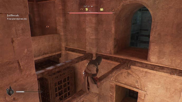 Basim balances on a beam while moving closer to Ali’s cell in the Damascus Gate Prison in Assassin’s Creed Mirage