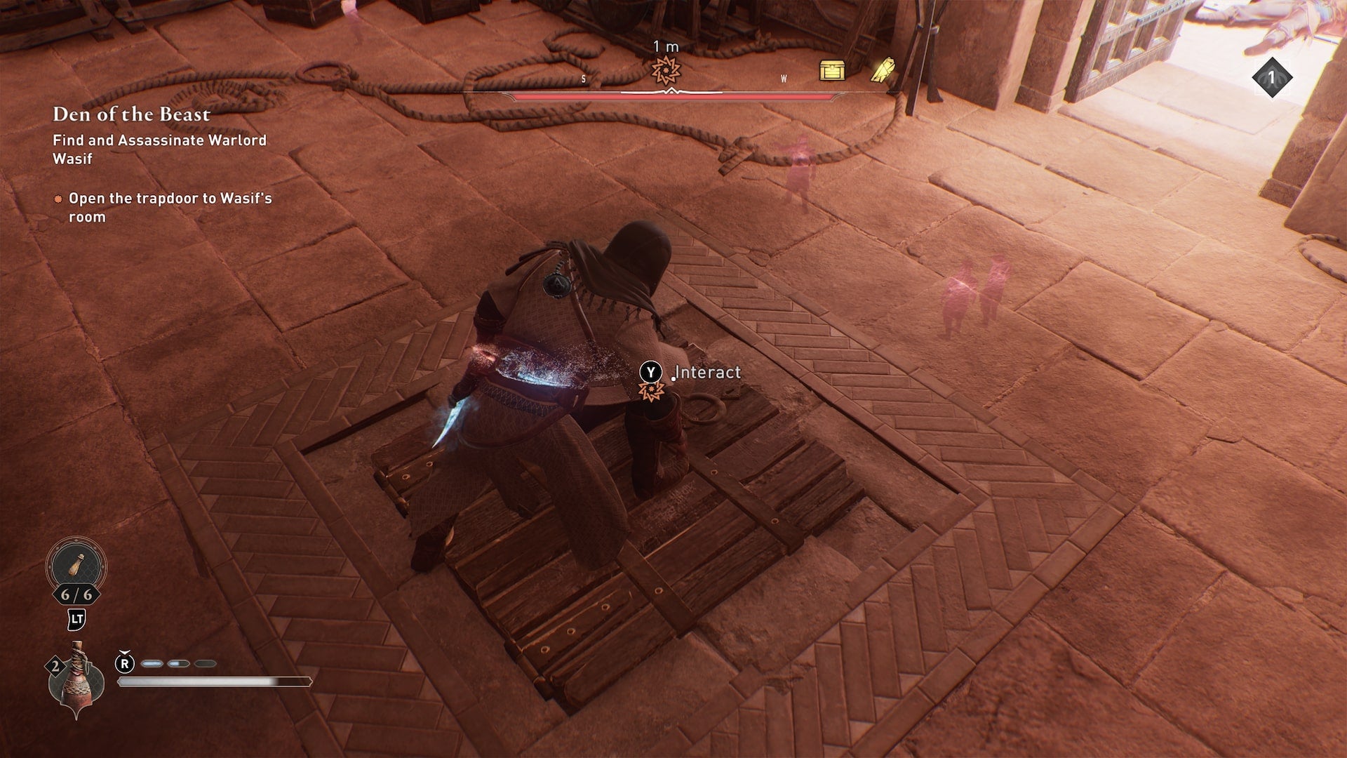 Basim interacts with a trapdoor in the Great Garrison that leads to Wasif&rsquo;s chamber in Assassin&rsquo;s Creed Mirage