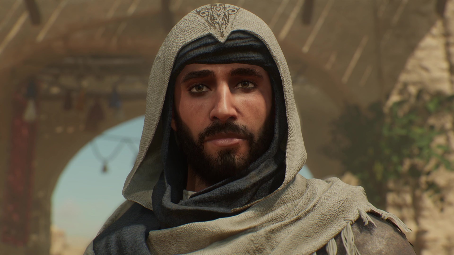 A close-up shot of Basim from Assassin&rsquo;s Creed Mirage in his assassin gear
