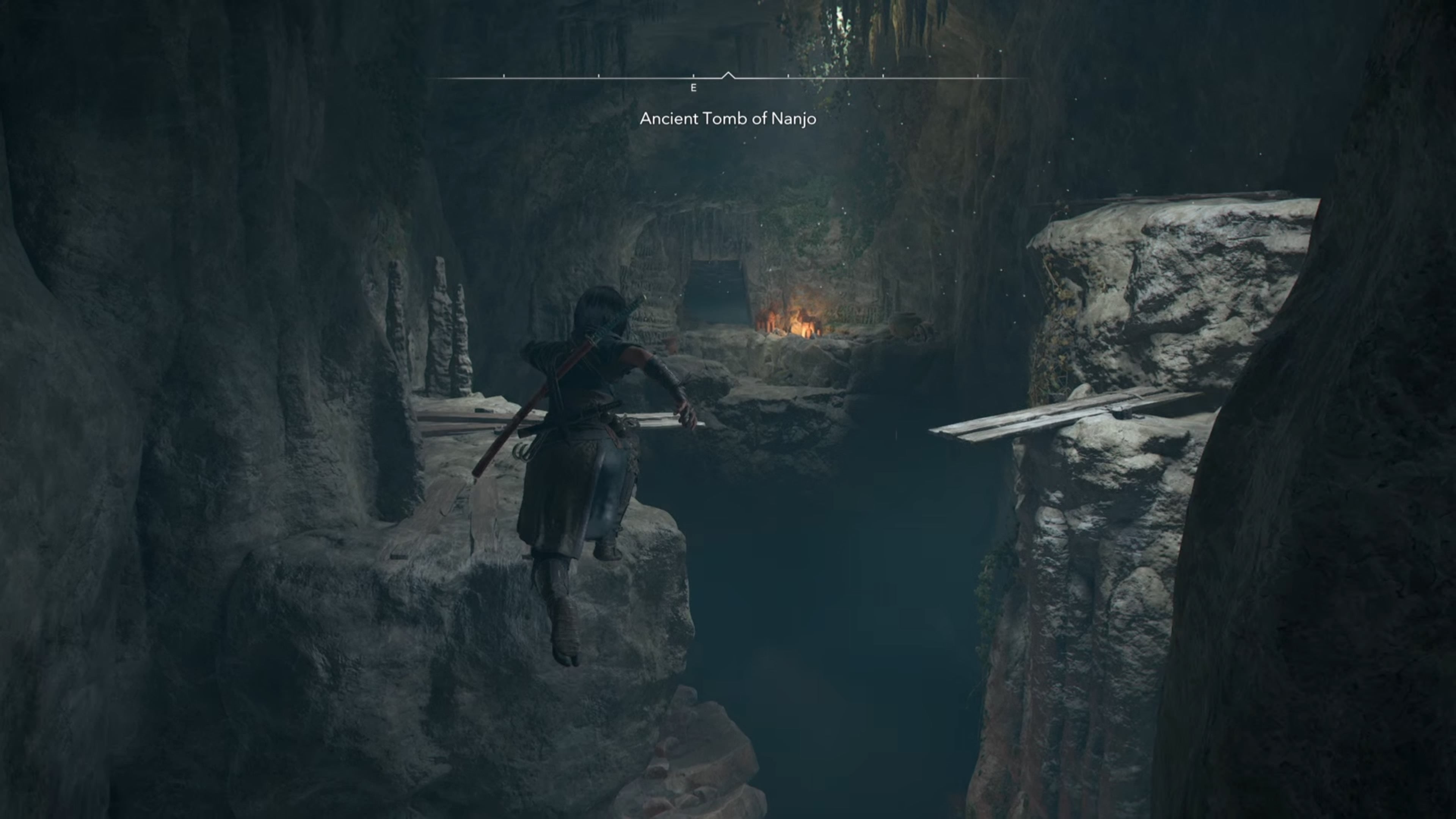 Naoe jumping in a cave in Assassin&rsquo;s Creed Shadows.