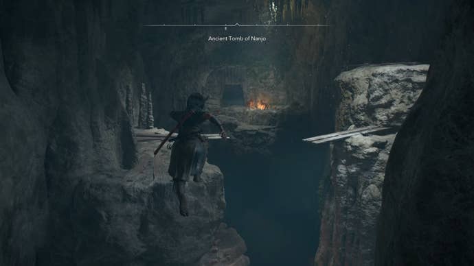 Naoe jumping in a cave in Assassin’s Creed Shadows.