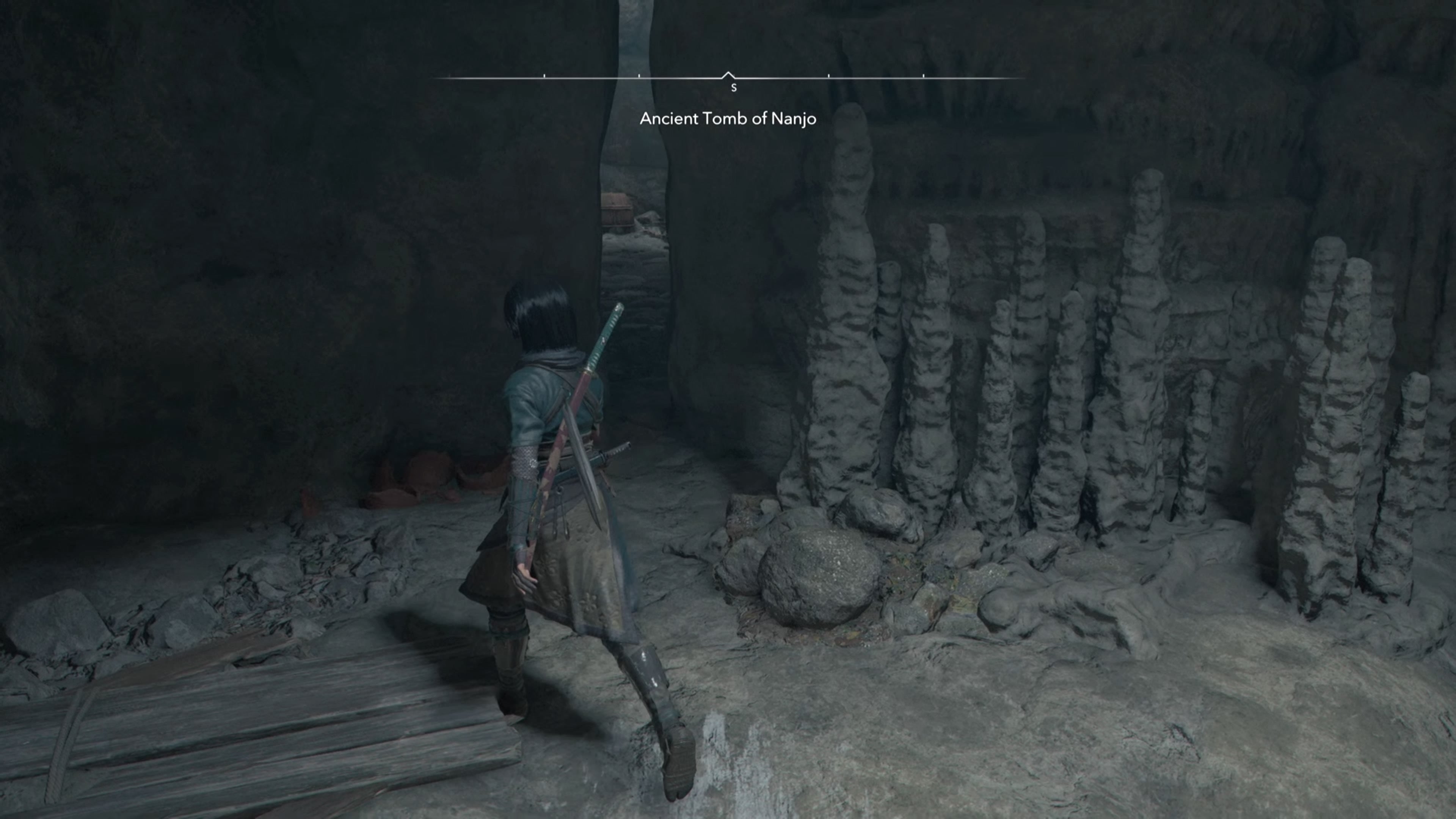Naoe in a cave in Assassin&rsquo;s Creed Shadows.