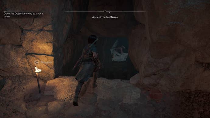 Naoe in a cave in Assassin’s Creed Shadows.