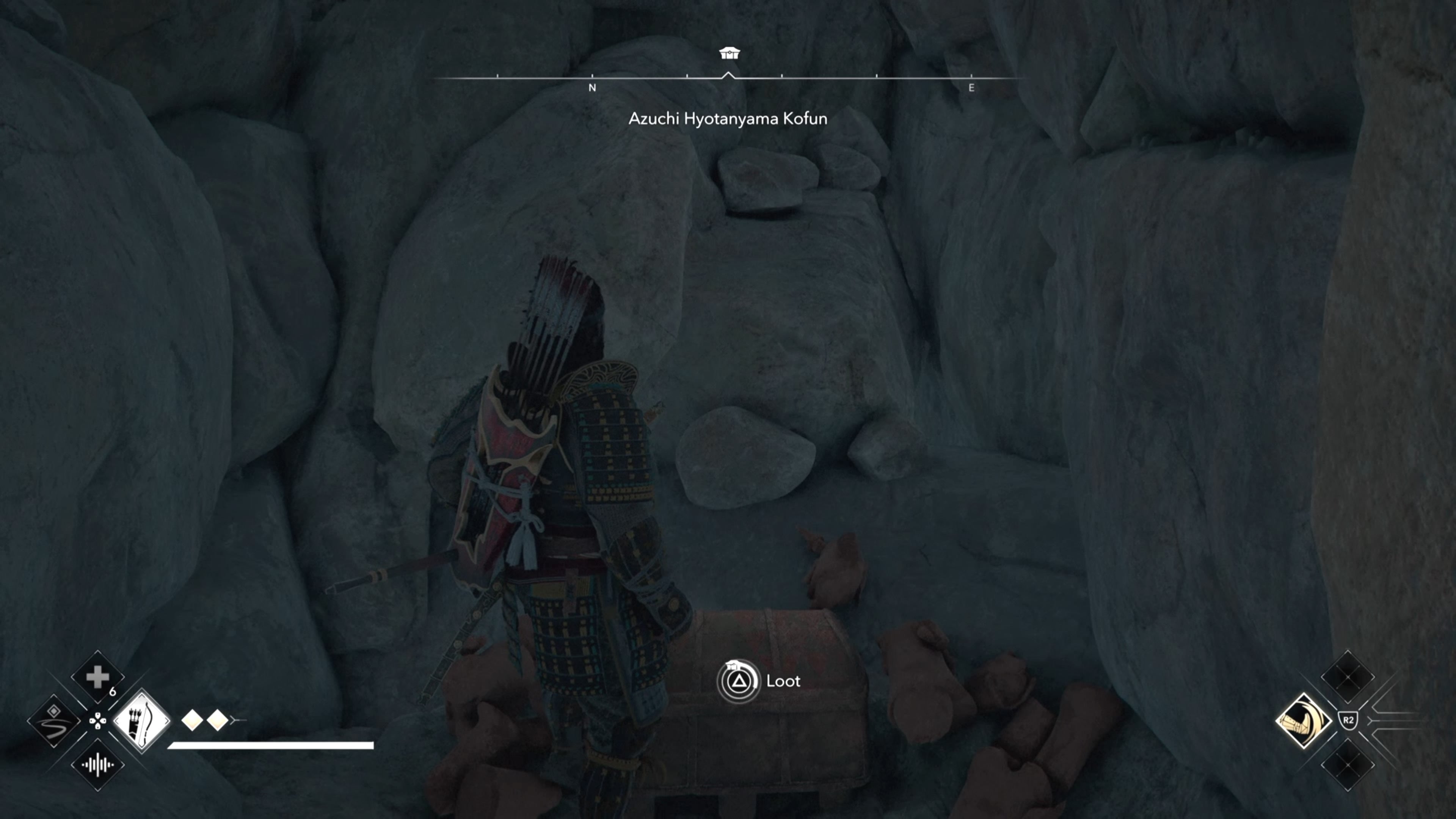 Yasuke looking at a ches inside the Azuchi Kyotanyama Kofun in Assassin&rsquo;s Creed Shadows.