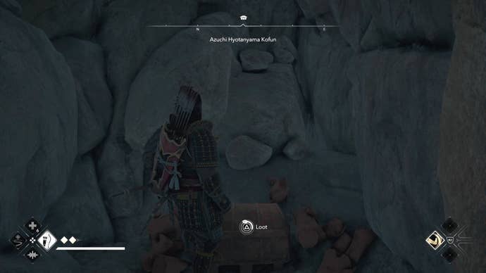 Yasuke looking at a ches inside the Azuchi Kyotanyama Kofun in Assassin’s Creed Shadows.