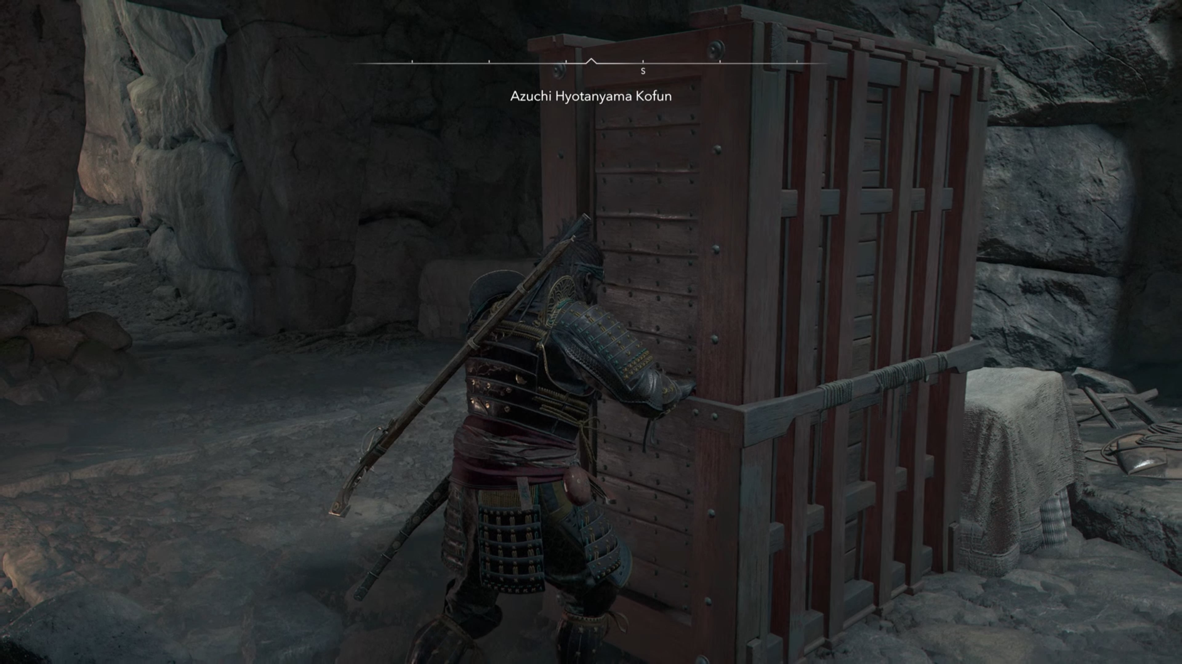 Yasuke pushing a block inside the Azuchi Kyotanyama Kofun in Assassin&rsquo;s Creed Shadows.