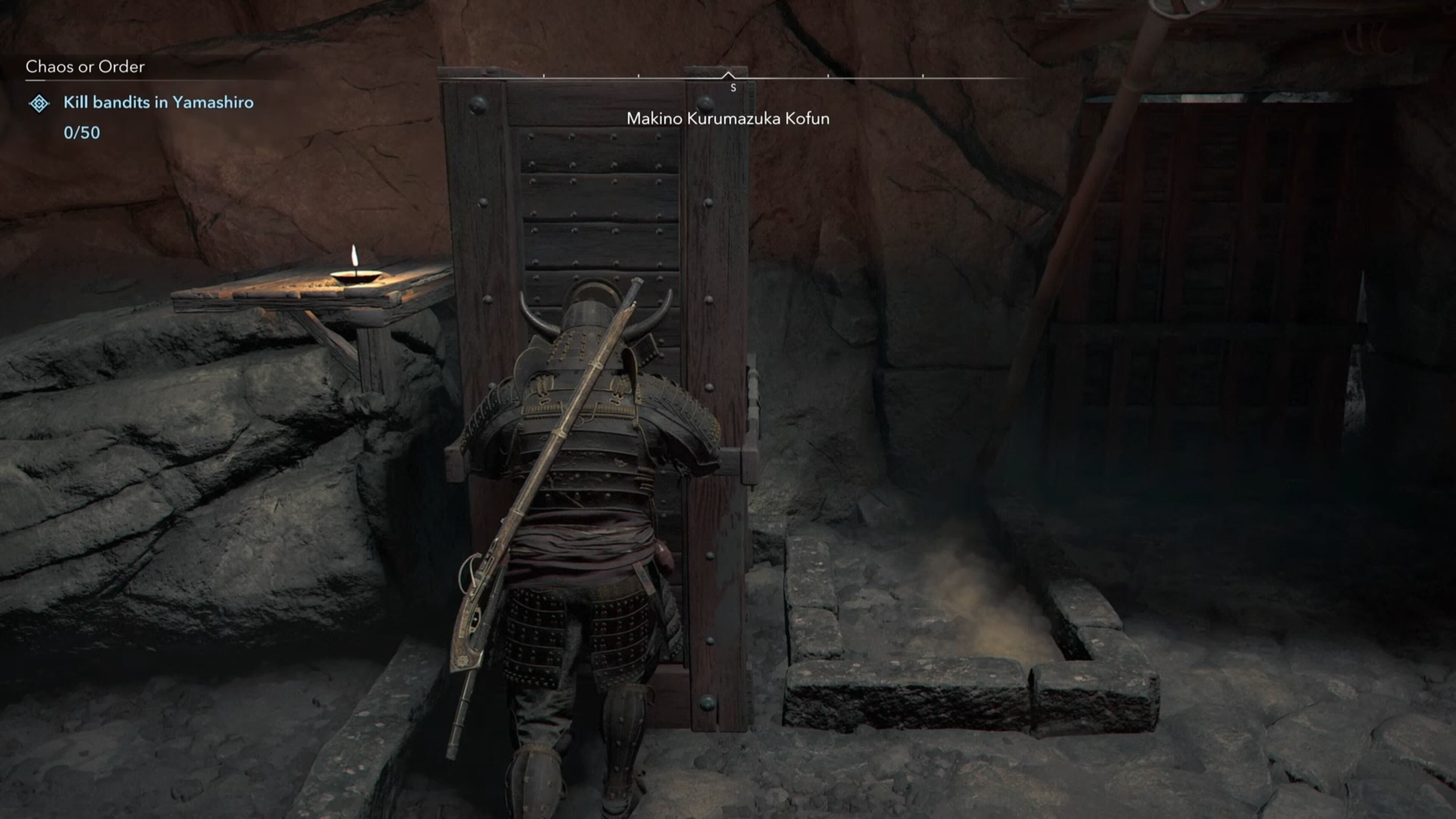 Yasuke pulling a wooden block in Assassin&rsquo;s Creed Shadows.