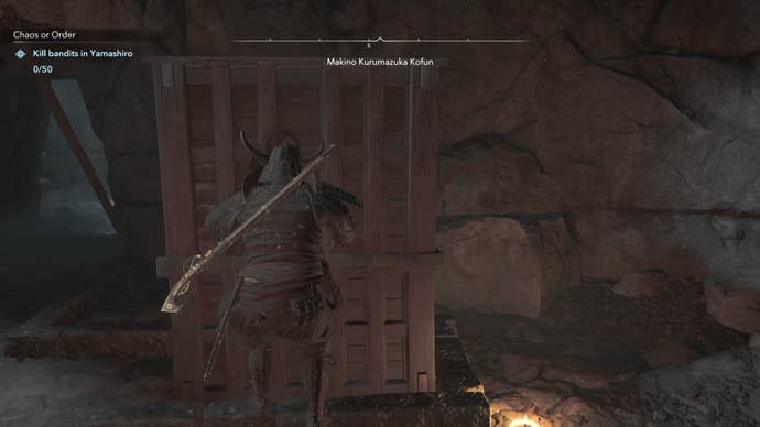 Yasuke moving a wooden block in Assassin’s Creed Shadows.