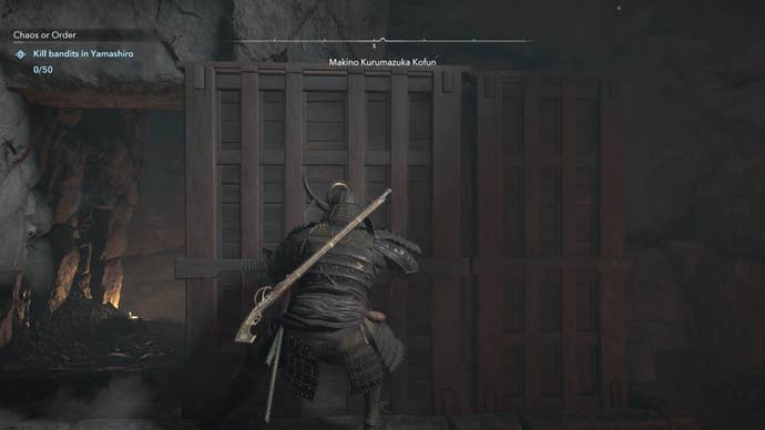 Yasuke moving a wooden block in Assassin’s Creed Shadows.
