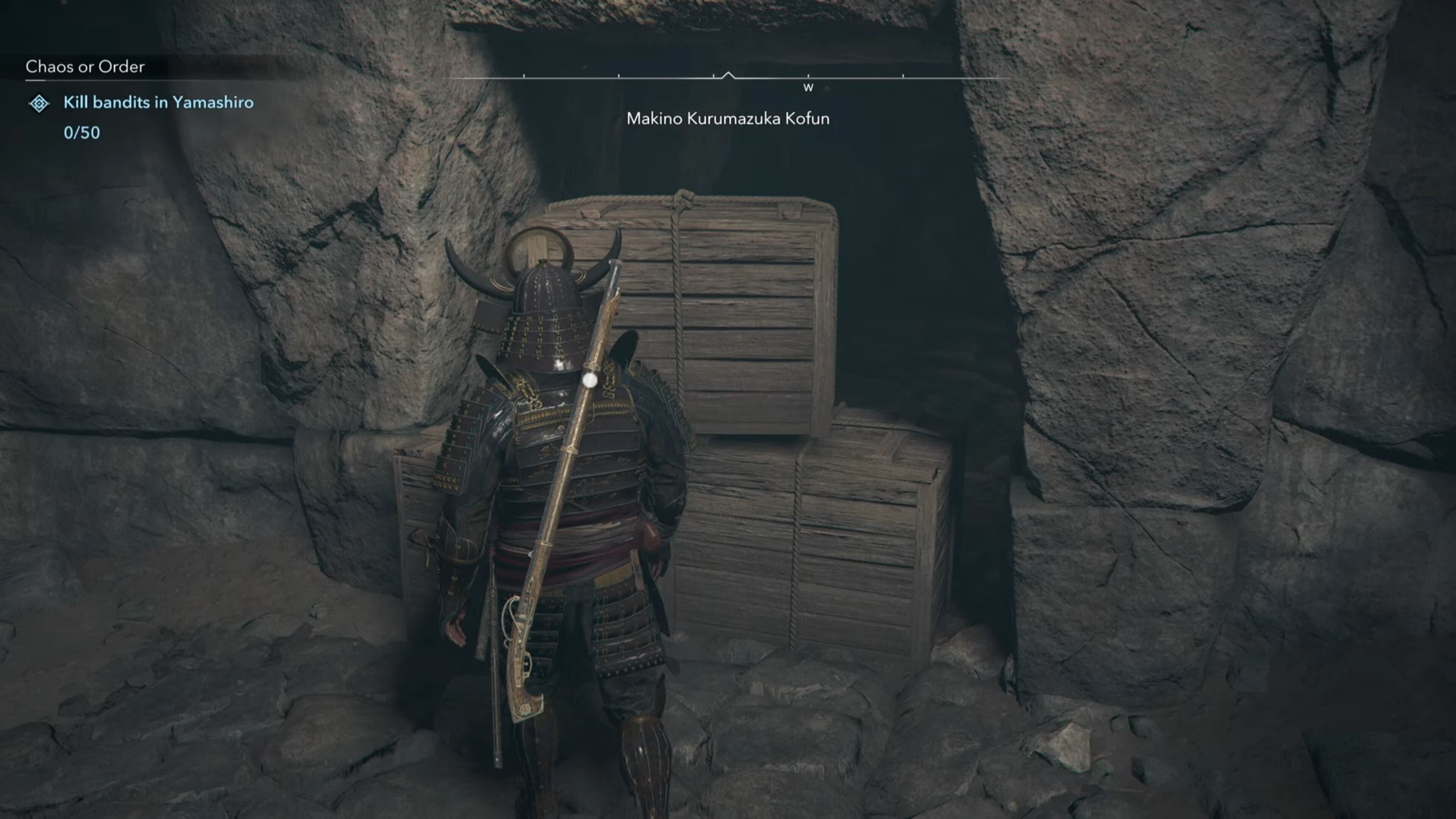 Yasuke looking at three wooden boxes in Assassin&rsquo;s Creed Shadows.