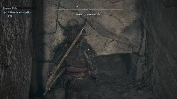 Yasuke looking at a gap in the wall in Assassin’s Creed Shadows.