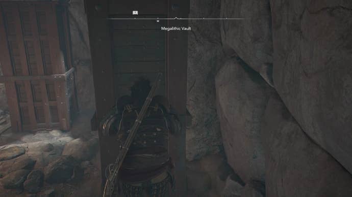 Yasuke pushing a block inside the Megalithic Vault Kofun in Assassin’s Creed Shadows.