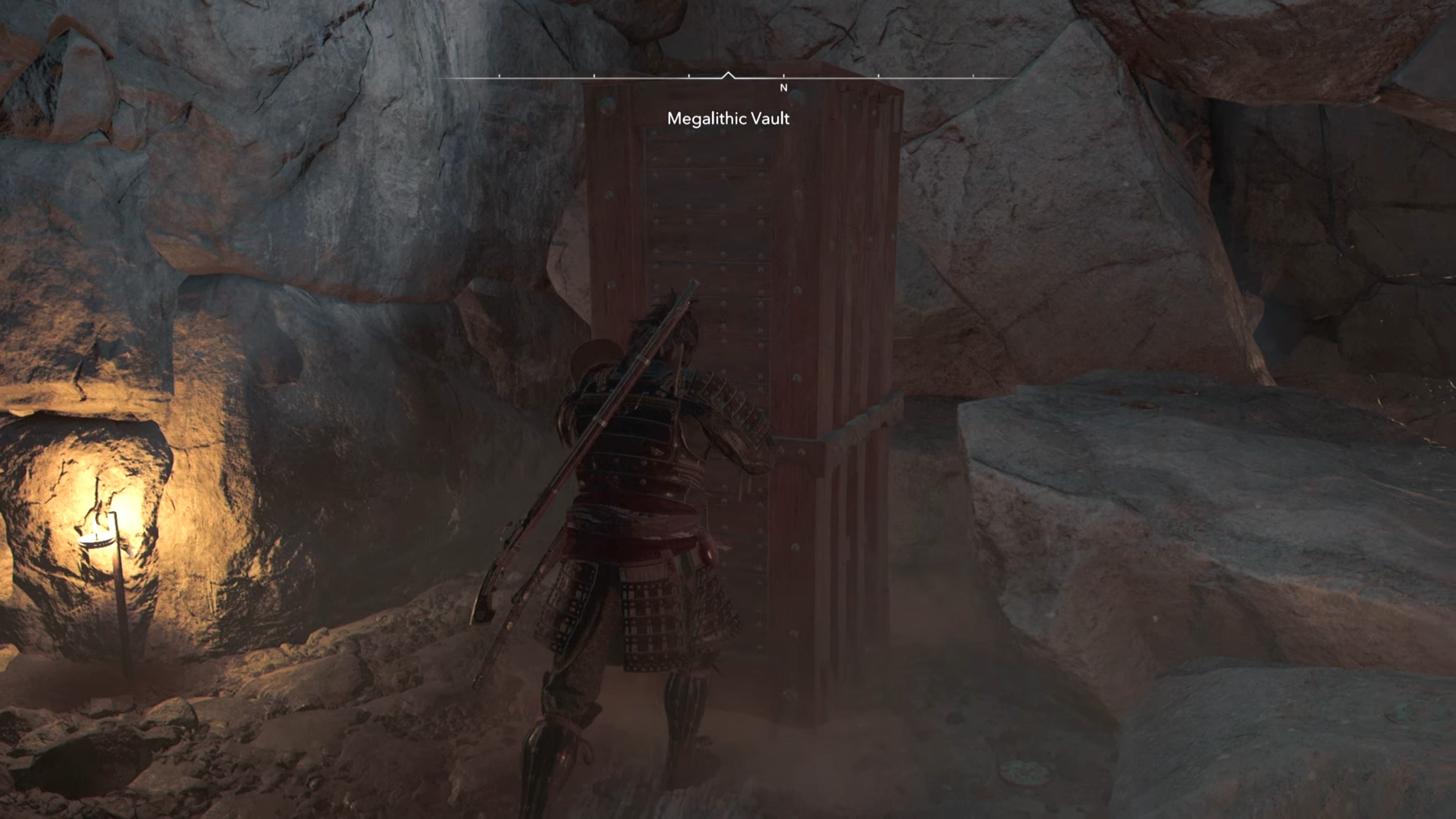 Yasuke pushing a block inside the Megalithic Vault Kofun in Assassin&rsquo;s Creed Shadows.