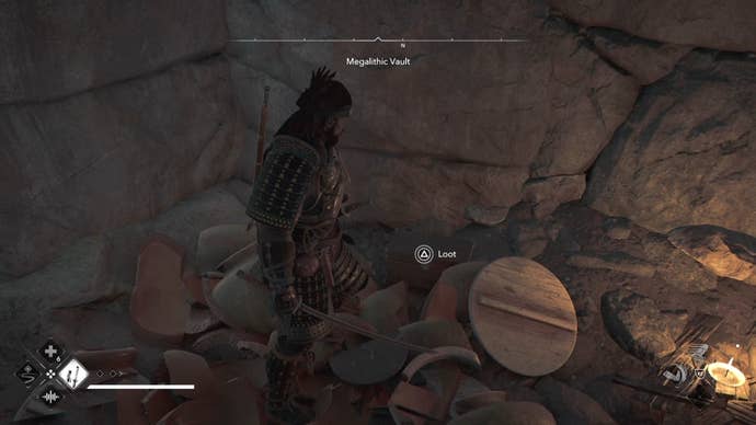 Yasuke looking at a chest inside the Megalithic Vault Kofun in Assassin’s Creed Shadows.