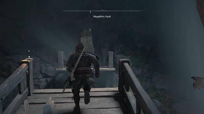 Yasuke running across a broken wooden bridge inside the Megalithic Vault Kofun in Assassin’s Creed Shadows.