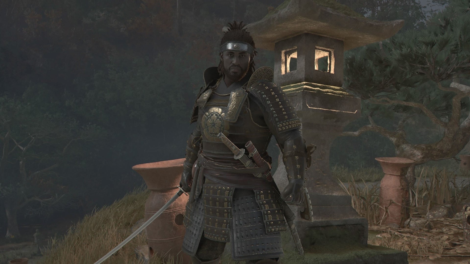 Yasuke brandishing his sword outside of the Megalithic Vault Kofun in Assassin&rsquo;s Creed Shadows.