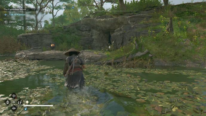 Naoe standing in shallow water outside of the Old Kofun in Assassin’s Creed Shadows.