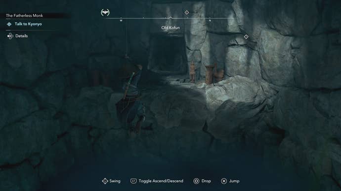 Naoe swinging across a chasm inside the Old Kofun in Assassin’s Creed Shadows.