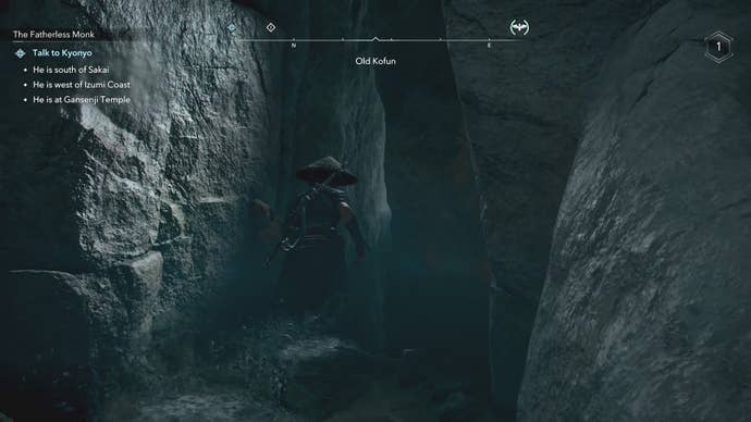 Naoe looking at a narrow gap in the wall inside the Old Kofun in Assassin’s Creed Shadows.