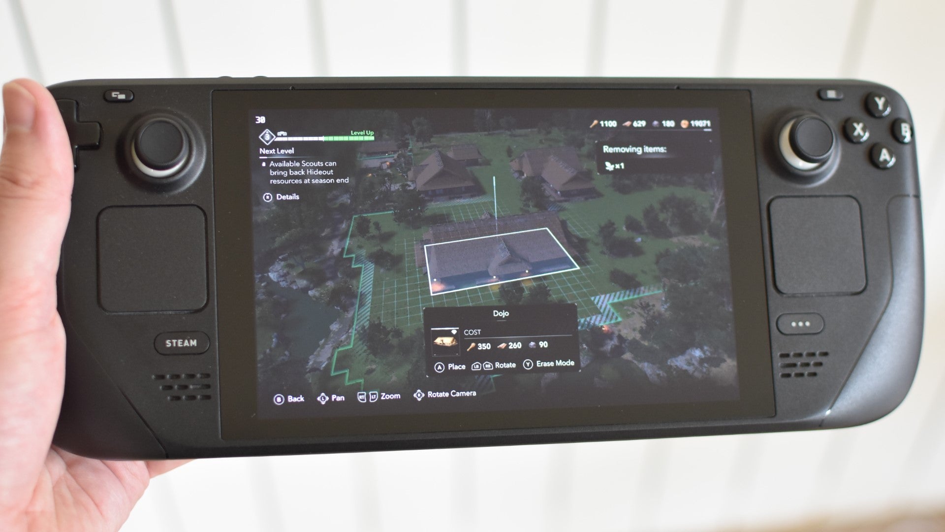 Building a hideout in Assassin&rsquo;s Creed Shadows, running on a Steam Deck.