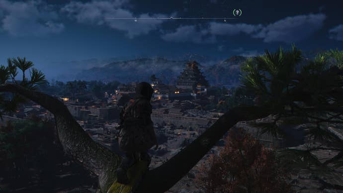 AC Shadows screenshot showing Naoe perched on Y-shaped branch looking towards Osaka in the middle-distance