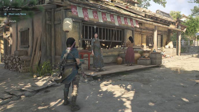 Naoe looking at an Ornament Vendor that sells a tea bowl in Assassin’s Creed Shadows.