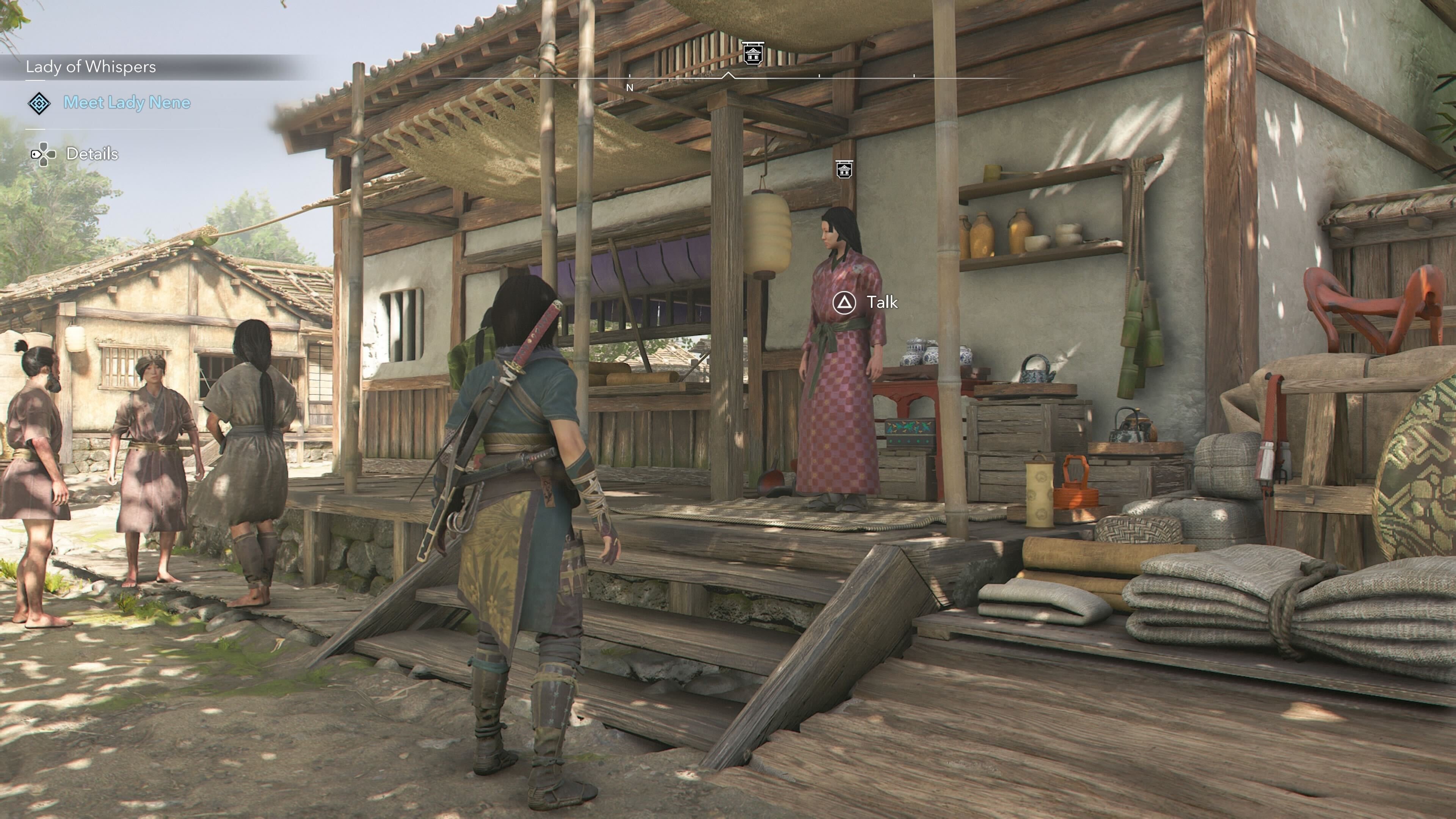 Naoe looking at an Ornament Vendor that sells a tea bowl in Assassin&rsquo;s Creed Shadows.