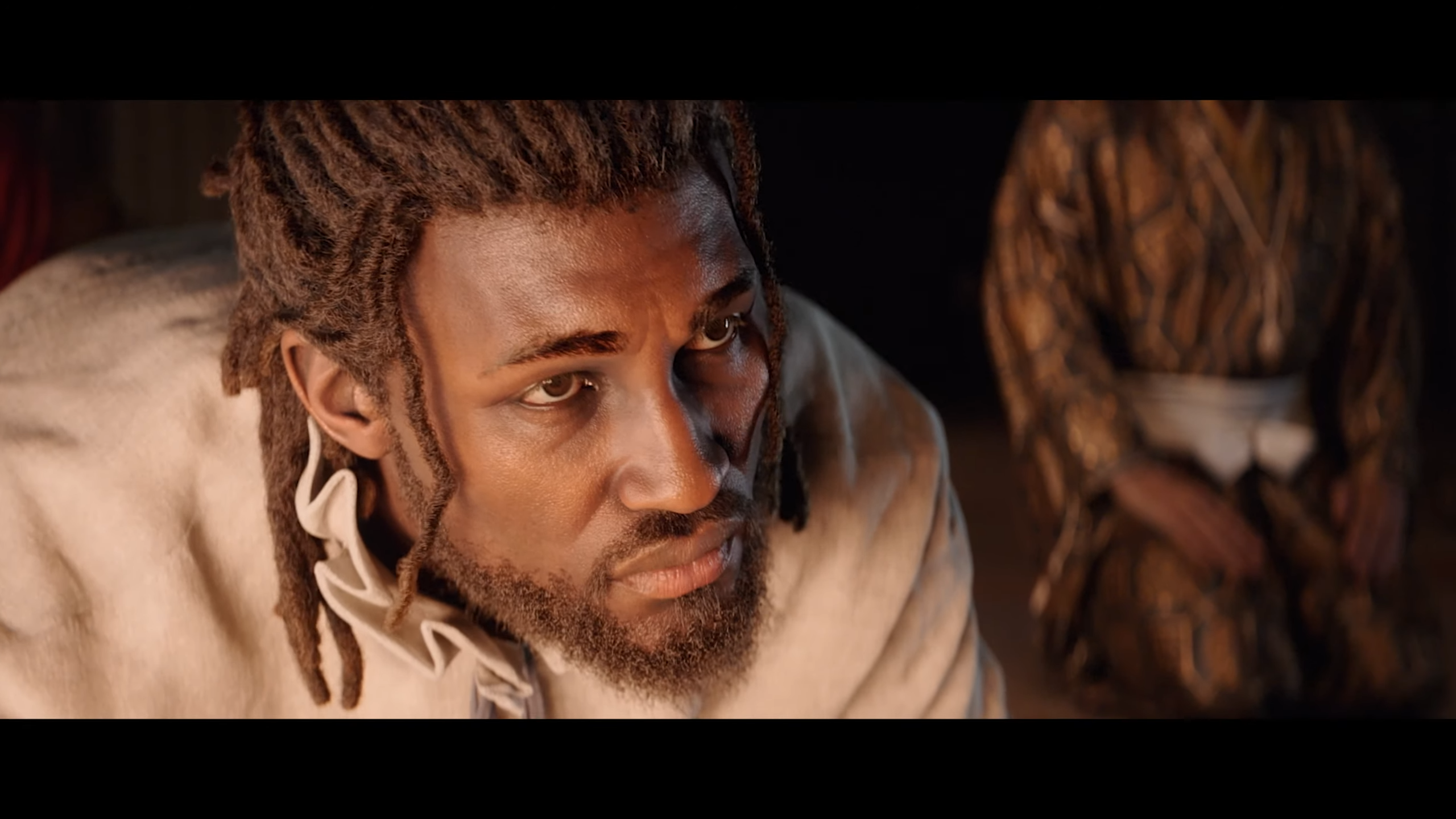 Assassin&rsquo;s Creed Shadows screenshot showing Yasuke kneeling.