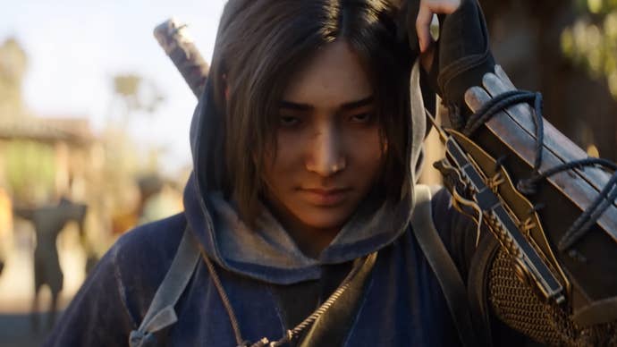 Assassin’s Creed Shadows trailer screenshot showing female shinobi pulling hood over her head