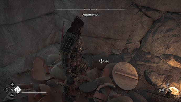 Yasuke looking at a chest inside the Kofun megalithic jump in the Shadows of Creed of Assassin.