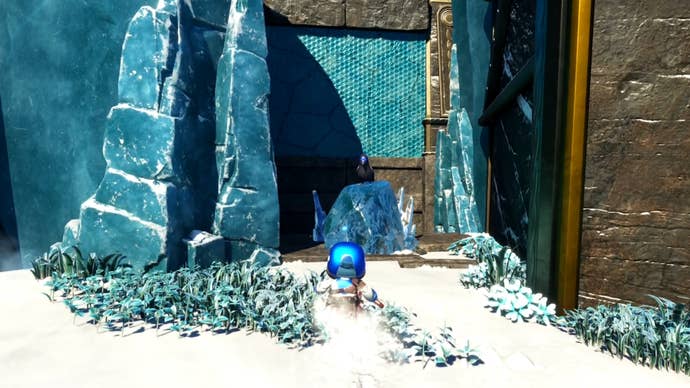 Astro in front of a black raven perched on a block of ice in Astro Bot.