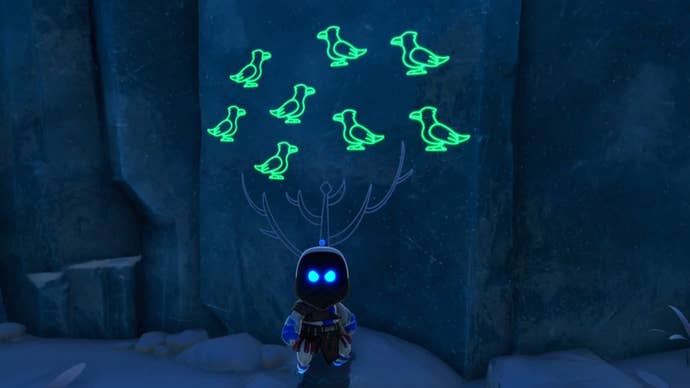 The Kratos Bot under a carving of eight green Ravens on stone in Astro Bot.