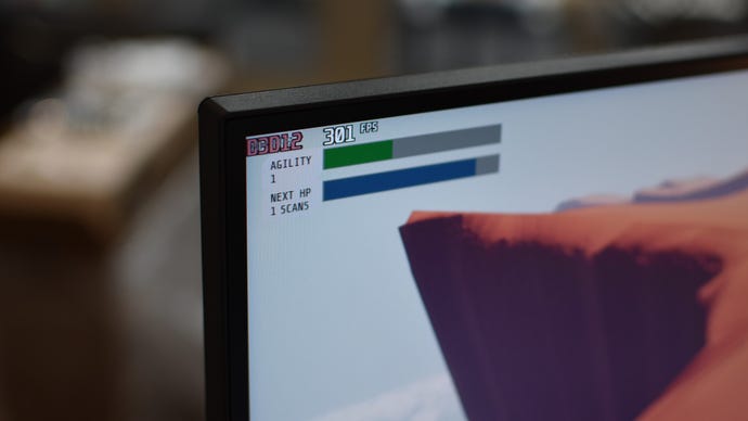 An FPS counter shows the Asus ROG Strix XG27UGC’s 1080p/320Hz mode running a game above 300fps.