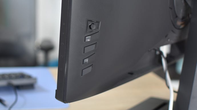 The rear button controls on the Asus ROG Strix XG27UGC multi-mode monitor.