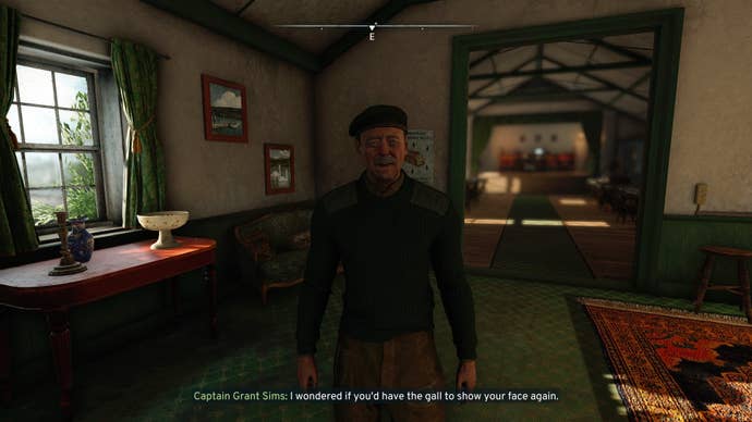 The player speaks to Captain Sims in the Village Hall in Atomfall