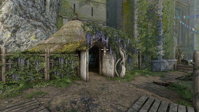 The player looks at the Castle Grounds Hut in Atomfall