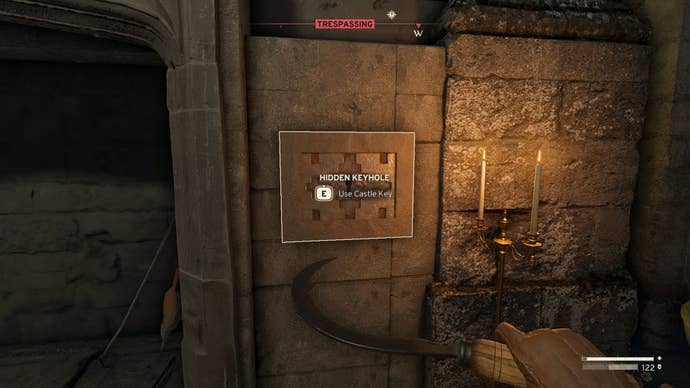 The player looks at the hidden keyhole found in the Druid’s Castle Ruins in Atomfall