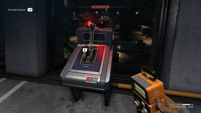 The player faces the Crane Controls Lever inside of the Interchange in Atomfall
