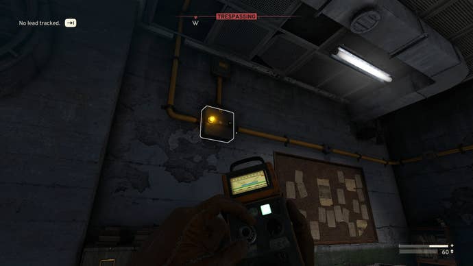 The player aims the Signal Redirector at a power junction in the Crane Controls Room in the Interchange in Atomfall
