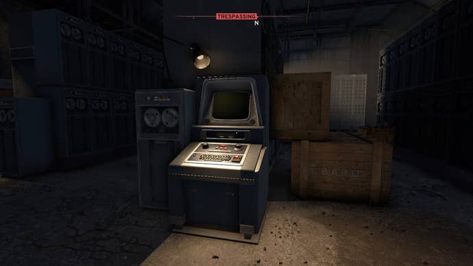 The player faces the disabled command console in the Dam of Casterfell Woods data warehouse in Atomfall