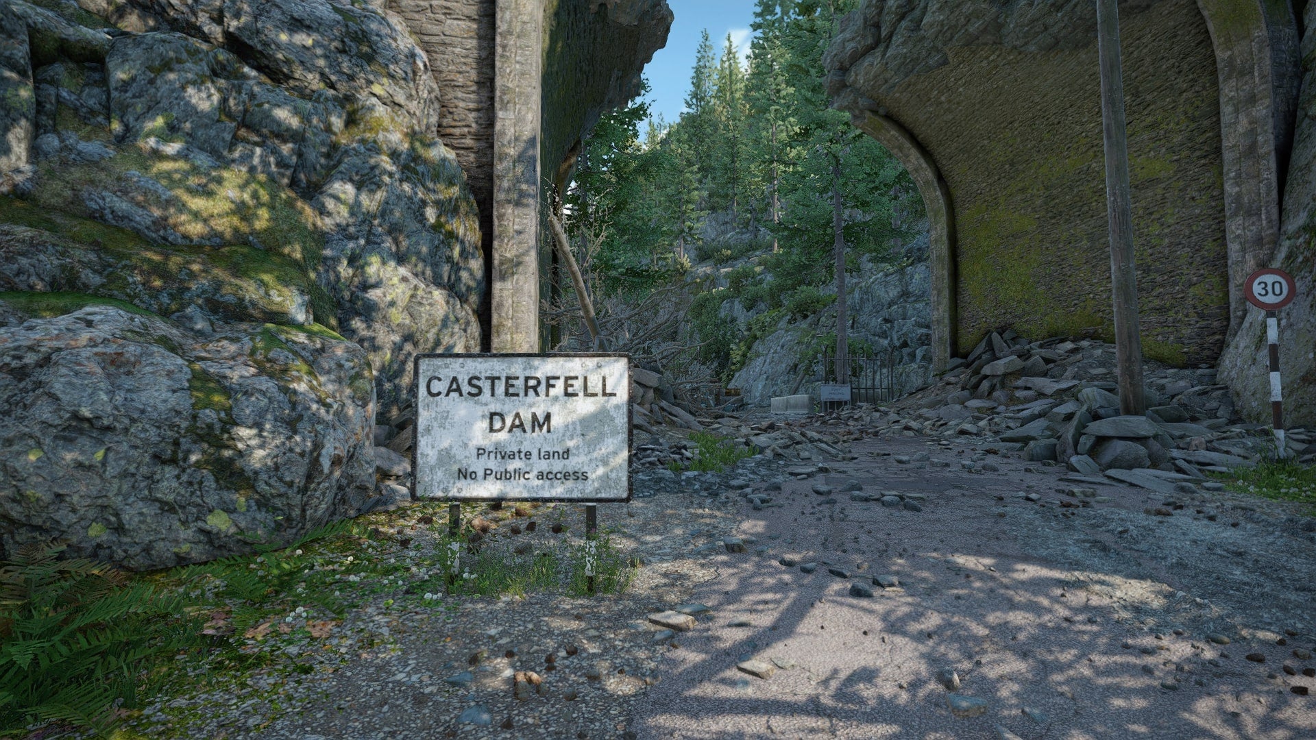 The player looks at a sign reading 'Casterfell Dam' as they approach the Dam Data Store in Casterfell Woods in Atomfall - 1