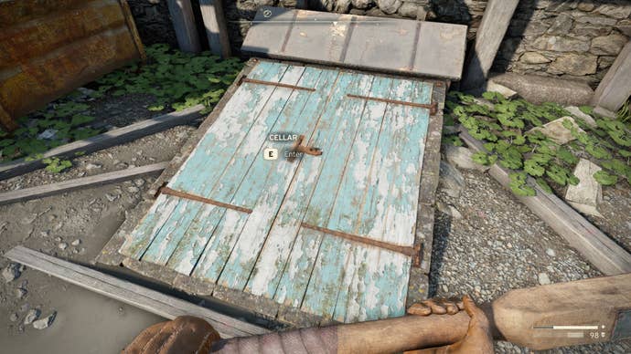 The player looks at an unnamed cellar found behind the Casterfell Woods Garden Centre in Atomfall