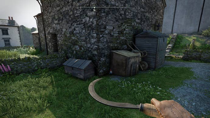 The player looks at a gnome sat at the back of an abandoned house in Wyndham Village in Atomfall