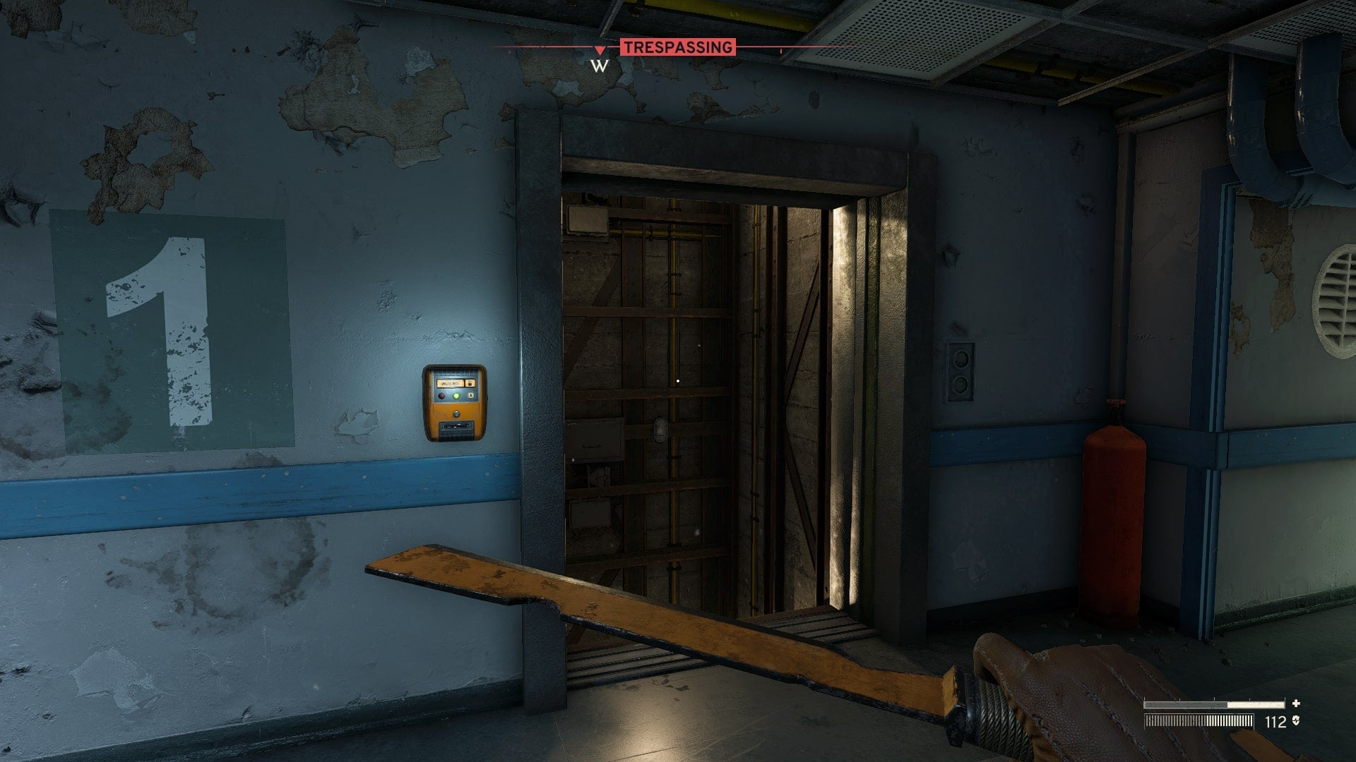 The player looks at the broken elevator on the first floor of medical in Atomfall - 4