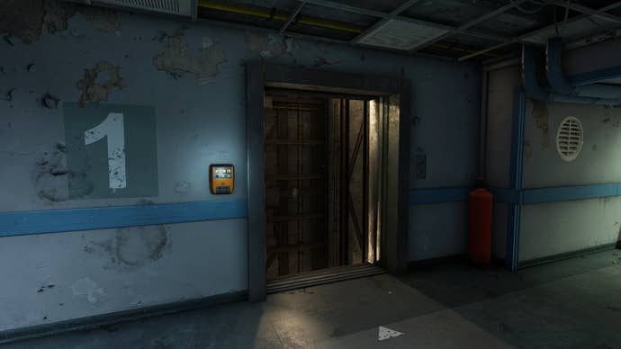 The player looks at the elevator on the first floor of the Medical wing in Atomfall